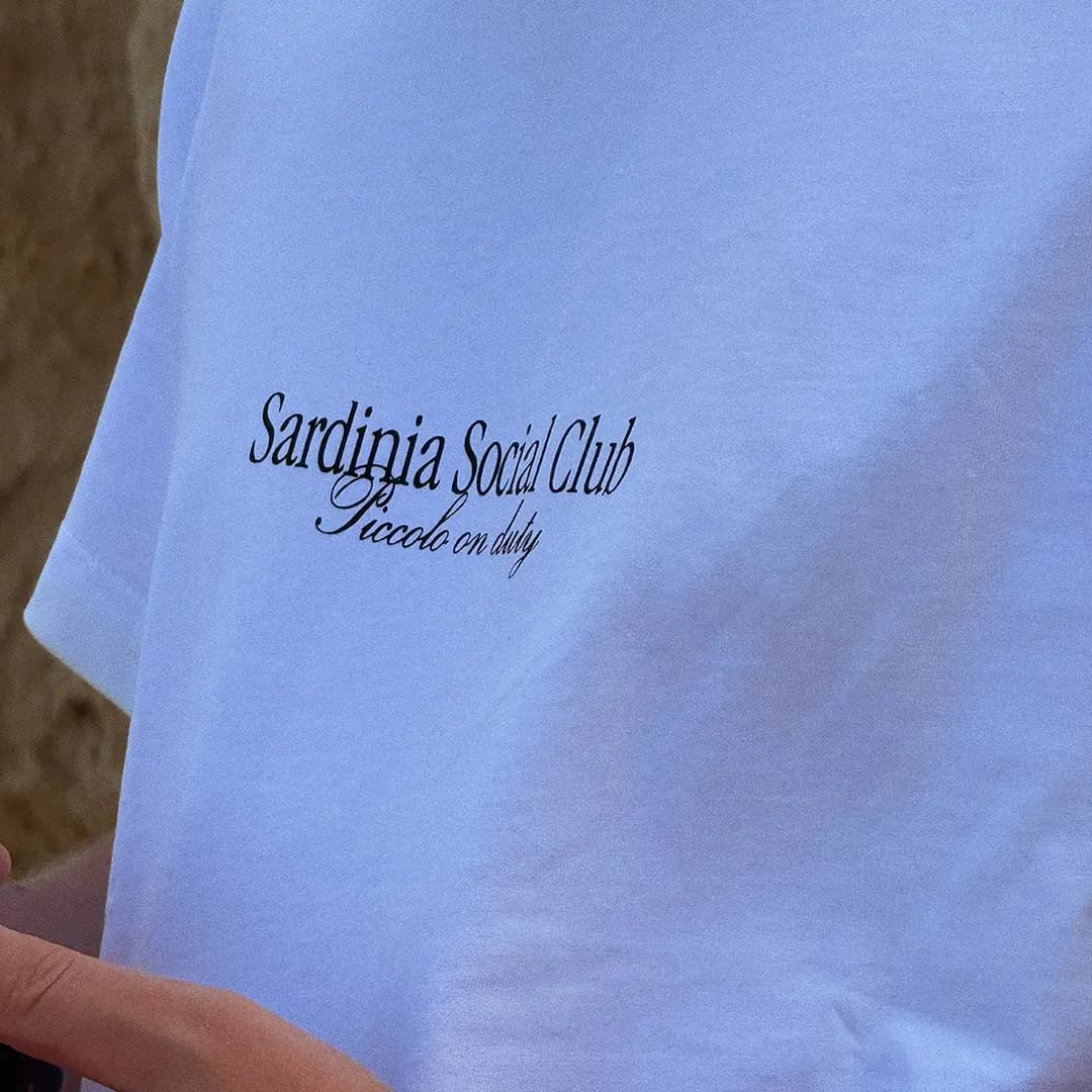 Belini cap hanging next to soda machine