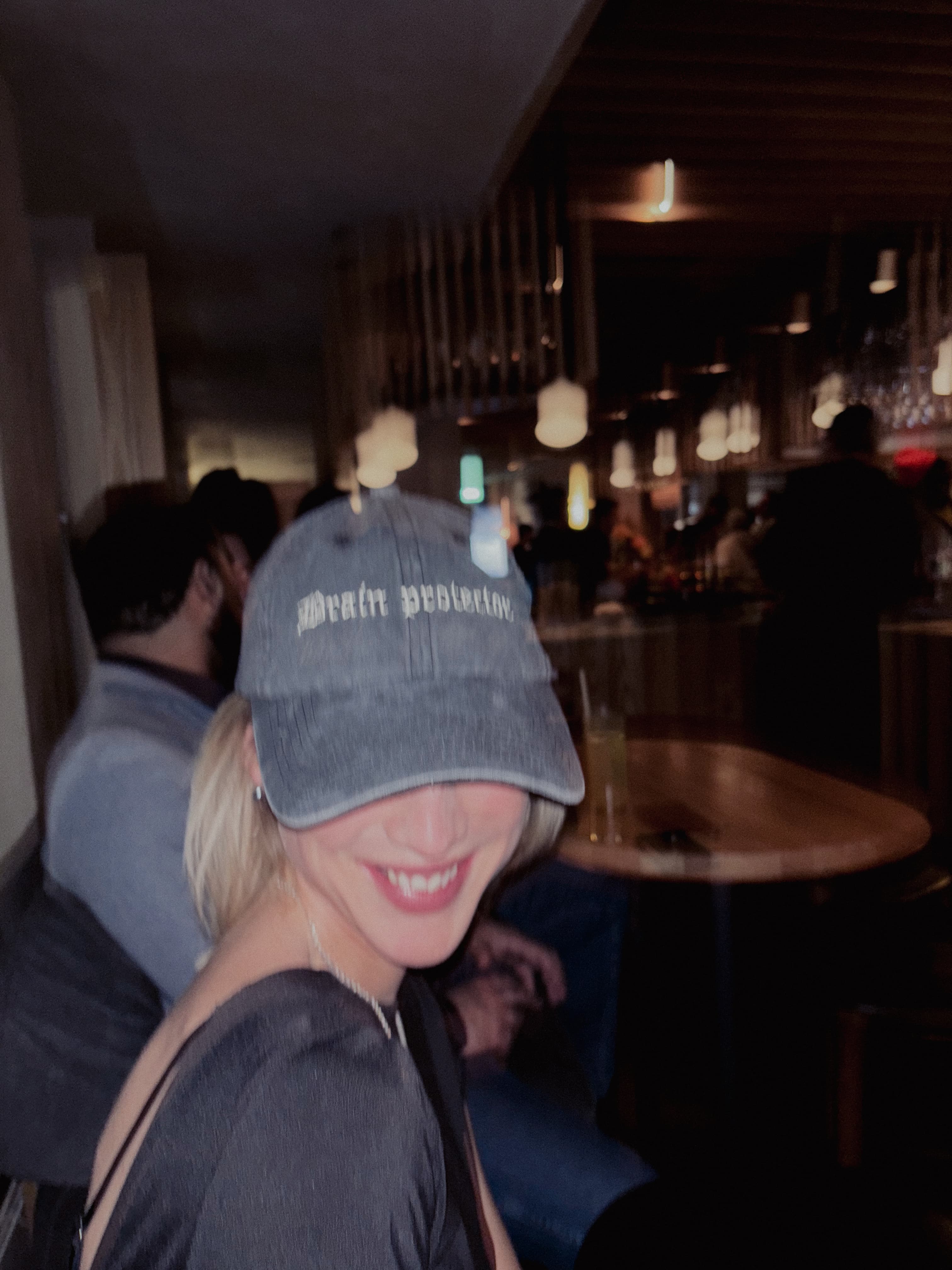 Woman wearing a Chateau Marmont Trucker Hat